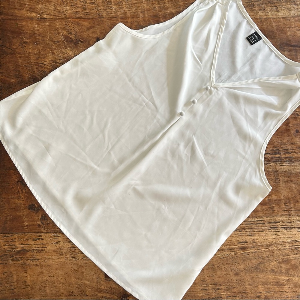 Sheer sleeveless blouse